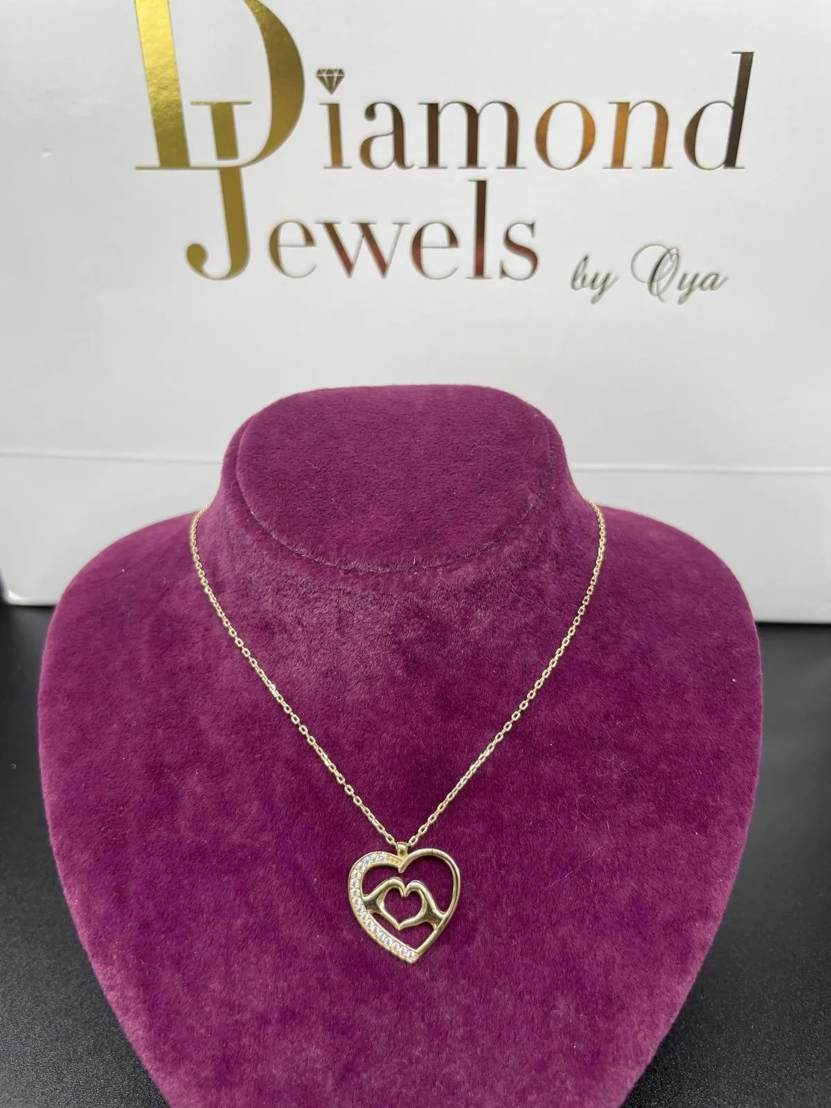 Goldkette mit verschlungenem Doppelherz